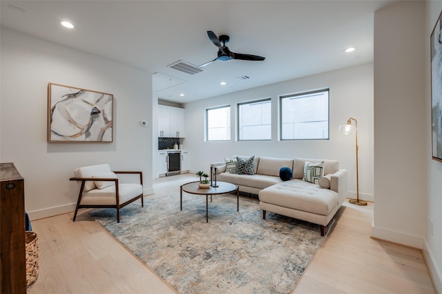 1851 Sul Ross St, Houston, TX 77098 - living room featuring light wood-style flooring, a ceiling fan, baseboards, and recessed lighting
