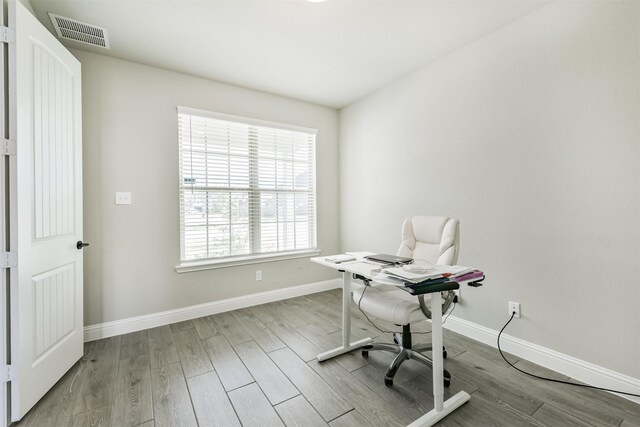 19303 Belmont Stakes Way, Tomball, TX 77377 - office area with wood finished floors and baseboards