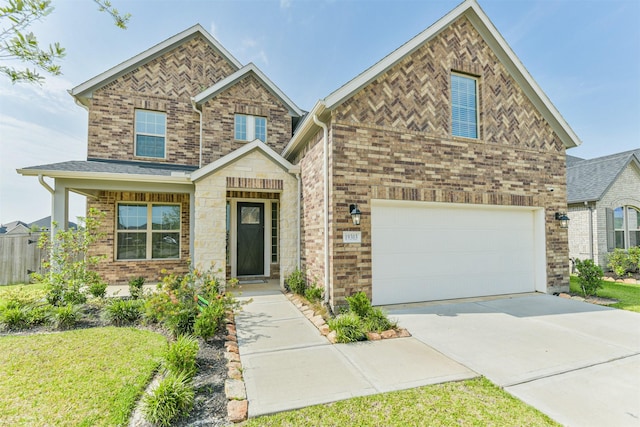 19303 Belmont Stakes Way, Tomball, TX 77377 - view of front facade featuring a garage, driveway, and brick siding