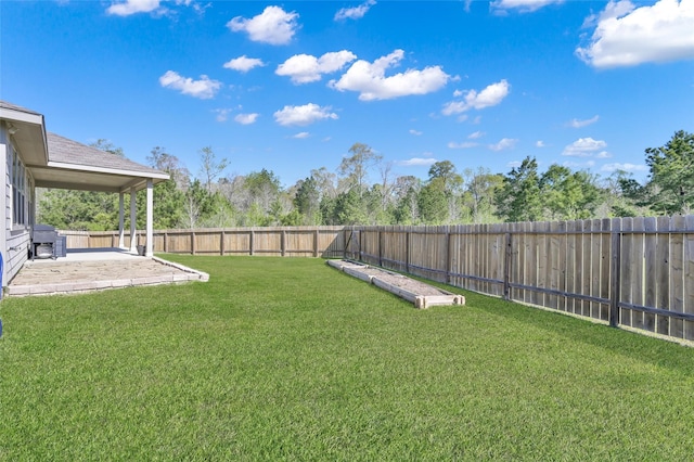 13999 Katlin Rd, Conroe, TX 77306 - view of yard featuring a patio area