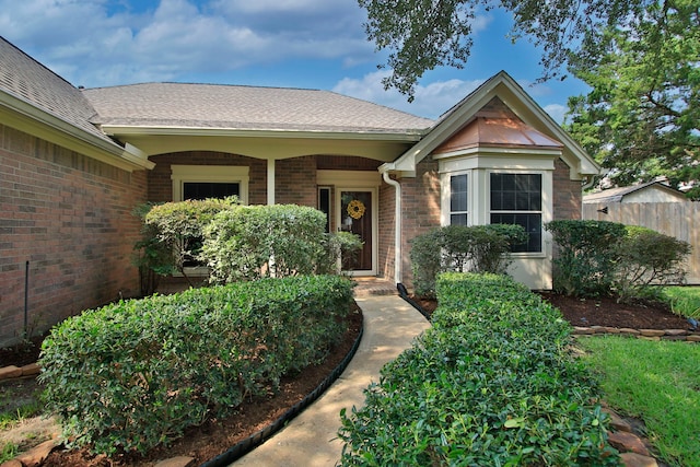 9515 Willow Crossing Dr, Houston, TX 77064 - entrance to property featuring brick siding and roof with shingles