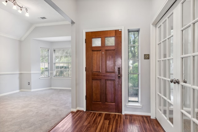9515 Willow Crossing Dr, Houston, TX 77064 - foyer entrance with crown molding, baseboards, dark wood-style floors, french doors, and vaulted ceiling