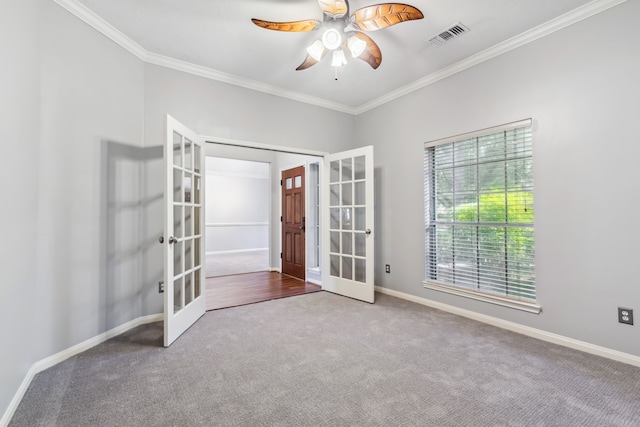 9515 Willow Crossing Dr, Houston, TX 77064 - carpeted empty room featuring french doors, ornamental molding, a ceiling fan, and baseboards