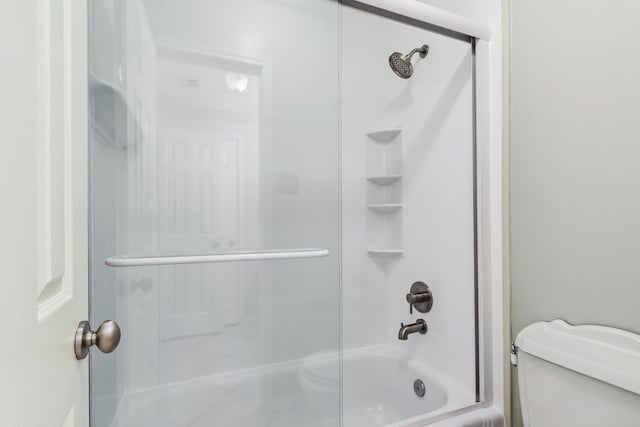 9515 Willow Crossing Dr, Houston, TX 77064 - full bath with toilet and bath / shower combo with glass door