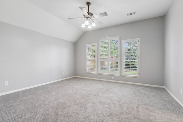 9515 Willow Crossing Dr, Houston, TX 77064 - empty room featuring ceiling fan, carpet floors, baseboards, and vaulted ceiling