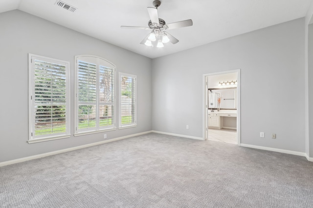 9515 Willow Crossing Dr, Houston, TX 77064 - empty room with light colored carpet, a ceiling fan, and baseboards