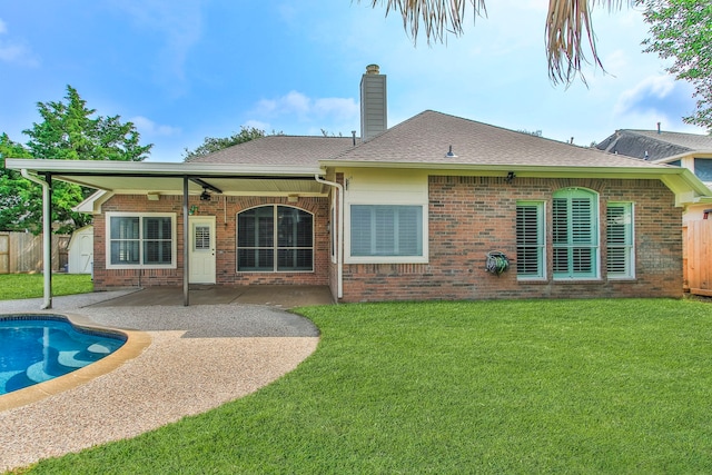 9515 Willow Crossing Dr, Houston, TX 77064 - rear view of house featuring a patio area, brick siding, a chimney, and a ceiling fan