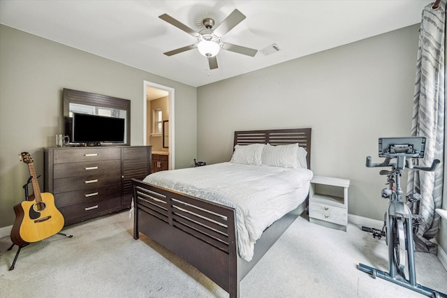6123 Stillman St, Houston, TX 77007 - bedroom featuring light carpet, baseboards, ceiling fan, and connected bathroom