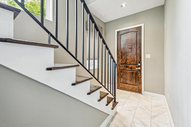 6123 Stillman St, Houston, TX 77007 - foyer featuring baseboards, stairs, marble look tile flooring, and recessed lighting