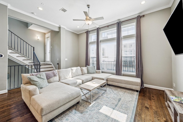 6123 Stillman St, Houston, TX 77007 - living room featuring ceiling fan, recessed lighting, wood finished floors, crown molding, and baseboards