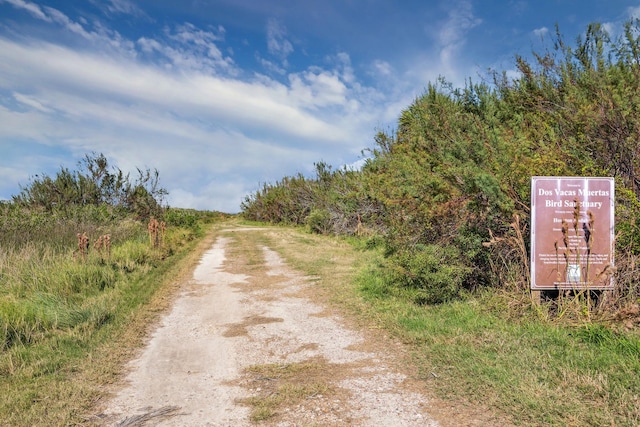 22409 Vista Del Mar, Galveston, TX 77554 - view of dirt / gravel road
