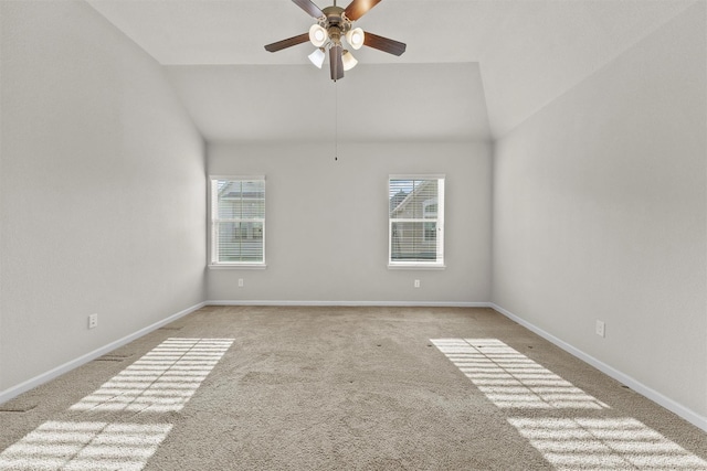 9611 Knights Station Dr, Houston, TX 77045 - empty room with vaulted ceiling, carpet, healthy amount of natural light, a ceiling fan, and baseboards
