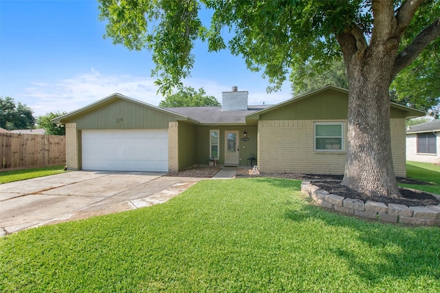 24 Wagon Lane Loop, Angleton, TX 77515 - single story home with brick siding, a chimney, an attached garage, concrete driveway, and roof with shingles