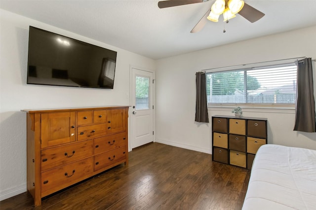 24 Wagon Lane Loop, Angleton, TX 77515 - bedroom featuring wood finished floors, baseboards, and ceiling fan