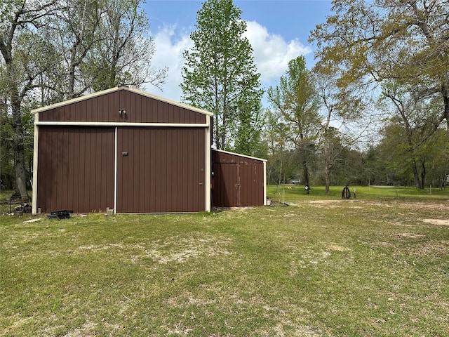 12857 Fm 1485th Rd, Conroe, TX 77306 - view of pole building with a yard