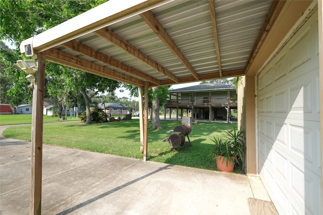 915 Live Oak Dr, Jones Creek, TX 77541 - view of patio with a garage
