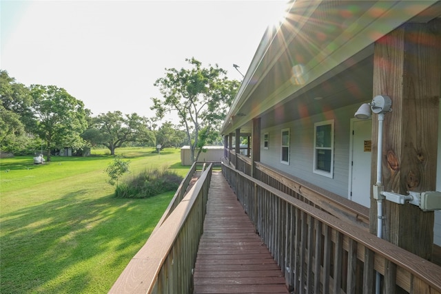 915 Live Oak Dr, Jones Creek, TX 77541 - wooden deck featuring a lawn