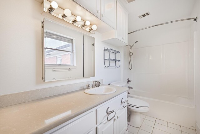 2920 Heron Dr, Galveston, TX 77551 - full bathroom featuring toilet, vanity, bathing tub / shower combination, and tile patterned floors