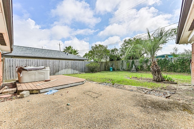 2920 Heron Dr, Galveston, TX 77551 - view of yard featuring a wooden deck