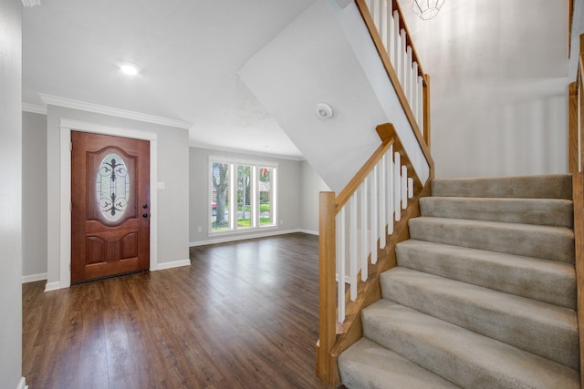 15735 Mesa Gardens Dr, Houston, TX 77095 - foyer entrance featuring stairway, ornamental molding, dark wood-type flooring, and baseboards
