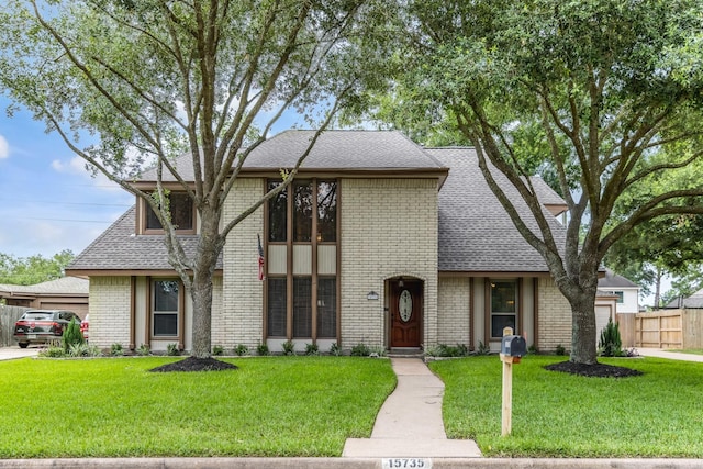 15735 Mesa Gardens Dr, Houston, TX 77095 - view of front of house featuring brick siding and roof with shingles