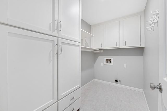 15735 Mesa Gardens Dr, Houston, TX 77095 - washroom featuring cabinet space, washer hookup, baseboards, and hookup for an electric dryer