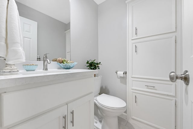 15735 Mesa Gardens Dr, Houston, TX 77095 - bathroom featuring vanity, toilet, and tile patterned floors
