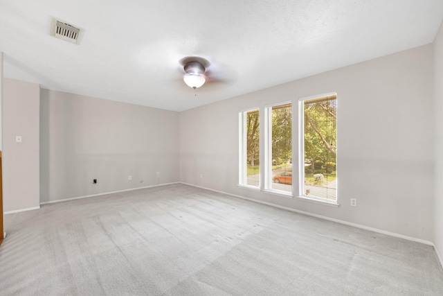 15735 Mesa Gardens Dr, Houston, TX 77095 - spare room featuring baseboards, light colored carpet, and a ceiling fan