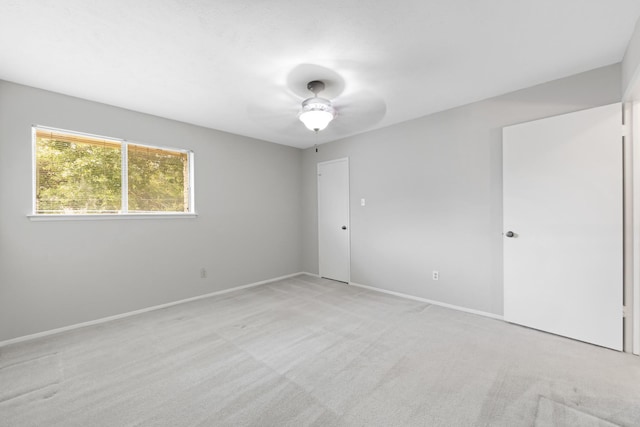 15735 Mesa Gardens Dr, Houston, TX 77095 - spare room with ceiling fan, light carpet, and baseboards