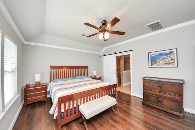5131 Kingship Ct, Katy, TX 77493 - bedroom featuring a barn door, dark wood-type flooring, multiple windows, baseboards, and ornamental molding