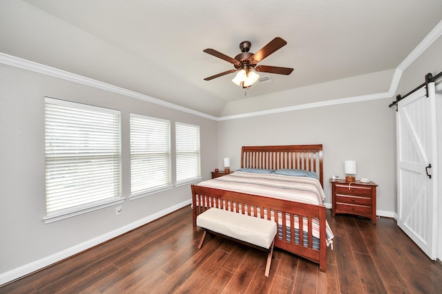 5131 Kingship Ct, Katy, TX 77493 - bedroom with a barn door, wood finished floors, baseboards, crown molding, and ceiling fan