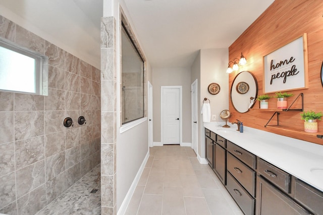 5131 Kingship Ct, Katy, TX 77493 - full bathroom with double vanity, a walk in shower, tile patterned flooring, and baseboards
