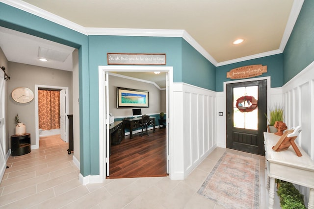 5131 Kingship Ct, Katy, TX 77493 - entrance foyer featuring light tile patterned flooring, ornamental molding, a decorative wall, and recessed lighting