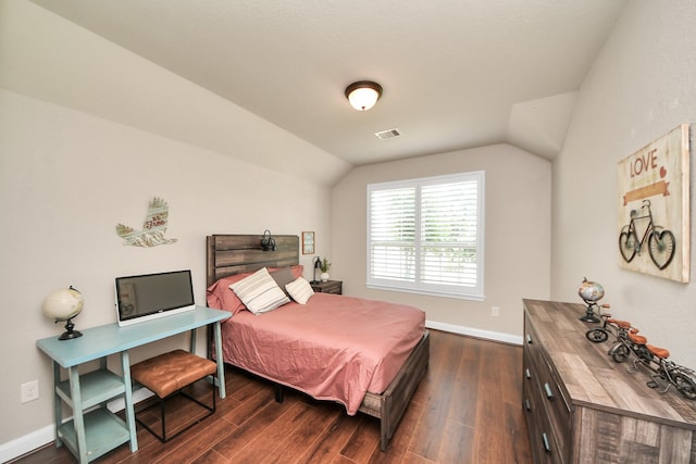 5131 Kingship Ct, Katy, TX 77493 - bedroom with dark wood-style flooring, lofted ceiling, and baseboards