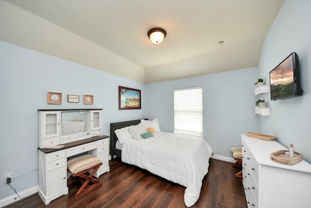5131 Kingship Ct, Katy, TX 77493 - bedroom featuring dark wood-style flooring, baseboards, and vaulted ceiling