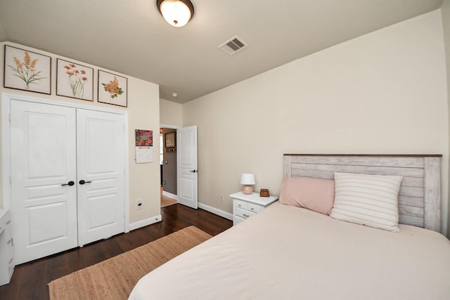 5131 Kingship Ct, Katy, TX 77493 - bedroom with dark wood finished floors, baseboards, and a closet