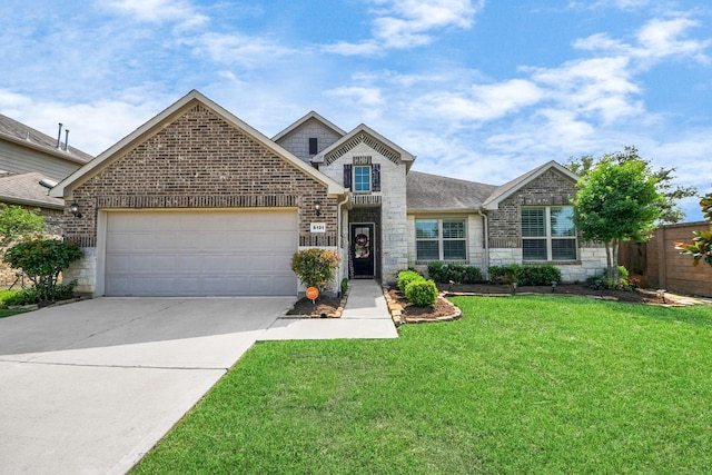 5131 Kingship Ct, Katy, TX 77493 - traditional home with stone siding, concrete driveway, an attached garage, brick siding, and roof with shingles