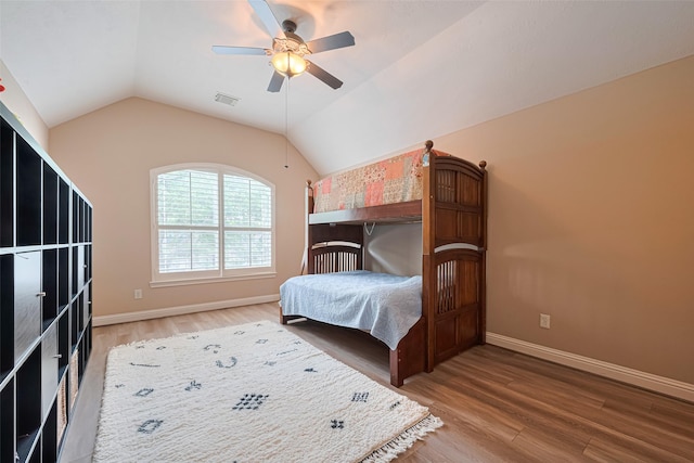 1623 Whitfield St, Sugar Land, TX 77479 - bedroom with wood finished floors, baseboards, lofted ceiling, and a ceiling fan