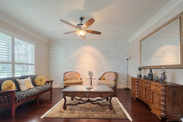 1623 Whitfield St, Sugar Land, TX 77479 - living area featuring baseboards, a ceiling fan, dark wood-type flooring, crown molding, and an accent wall