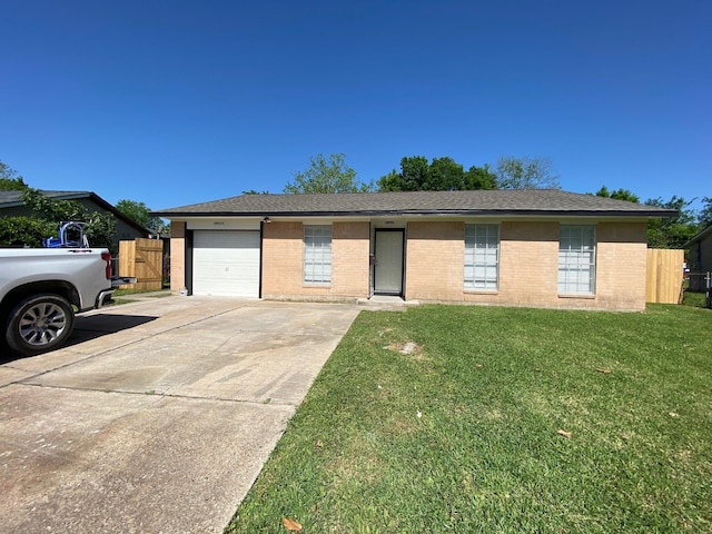 14311 Waterloo Dr, Houston, TX 77045 - ranch-style house featuring brick siding, concrete driveway, and an attached garage