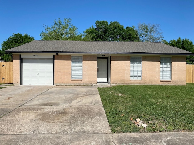 14311 Waterloo Dr, Houston, TX 77045 - single story home featuring brick siding, a shingled roof, an attached garage, and concrete driveway