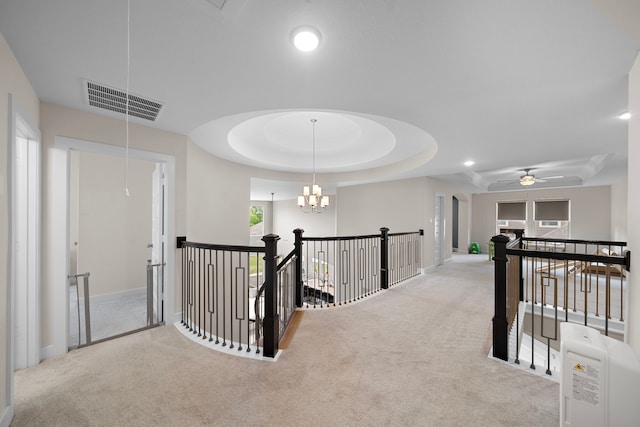 8211 Barristan Bluffs Ct, Magnolia, TX 77354 - hall featuring an upstairs landing, carpet, a tray ceiling, baseboards, and recessed lighting