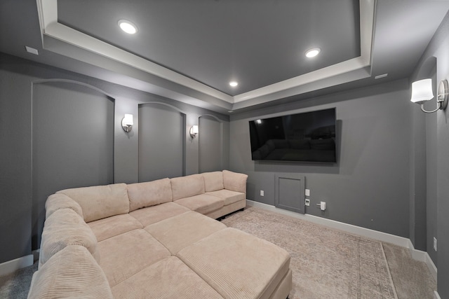 8211 Barristan Bluffs Ct, Magnolia, TX 77354 - carpeted cinema with a tray ceiling, baseboards, and recessed lighting