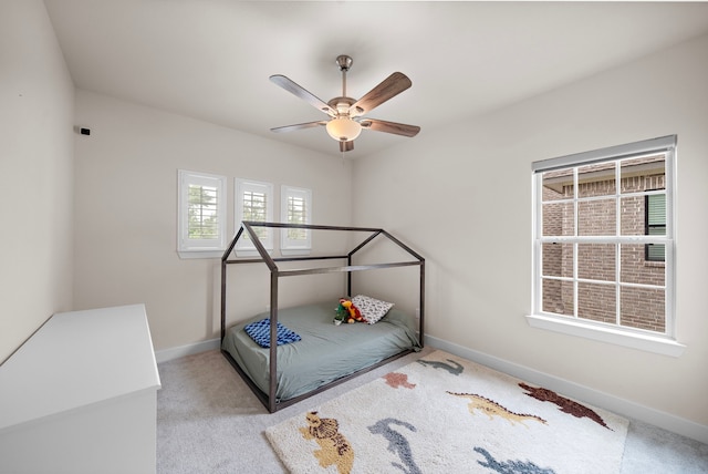 8211 Barristan Bluffs Ct, Magnolia, TX 77354 - bedroom with baseboards, carpet, and ceiling fan