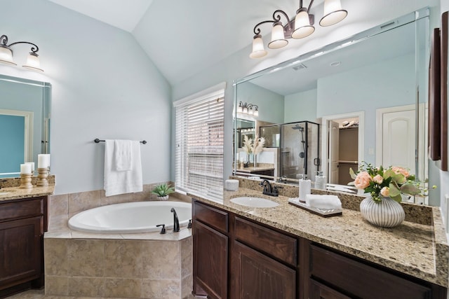 19403 Shady Edge Dr, Cypress, TX 77433 - bathroom with a shower stall, vanity, a garden tub, and vaulted ceiling
