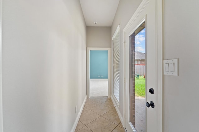 19403 Shady Edge Dr, Cypress, TX 77433 - hallway with light tile patterned floors, plenty of natural light, and baseboards