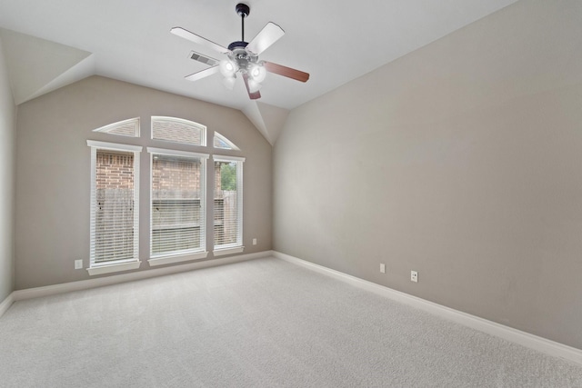 19403 Shady Edge Dr, Cypress, TX 77433 - spare room featuring carpet floors, a ceiling fan, baseboards, and vaulted ceiling