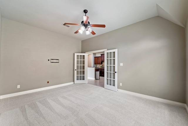 19403 Shady Edge Dr, Cypress, TX 77433 - spare room featuring french doors, light colored carpet, baseboards, a ceiling fan, and lofted ceiling