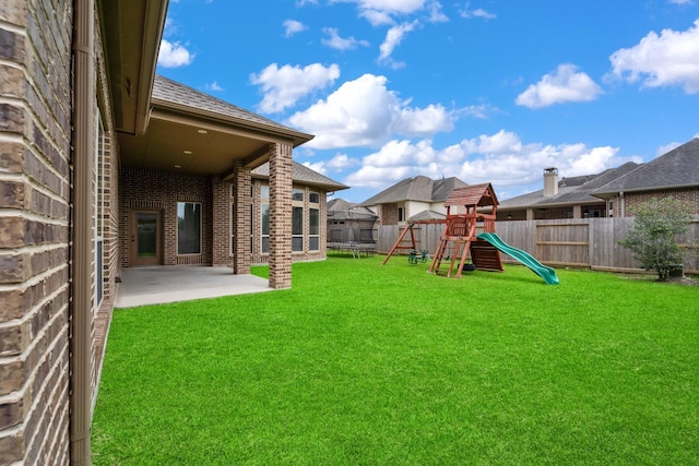 19403 Shady Edge Dr, Cypress, TX 77433 - view of yard with a patio area and a playground