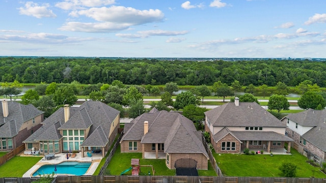 19403 Shady Edge Dr, Cypress, TX 77433 - aerial perspective of suburban area featuring a pool area and a forest